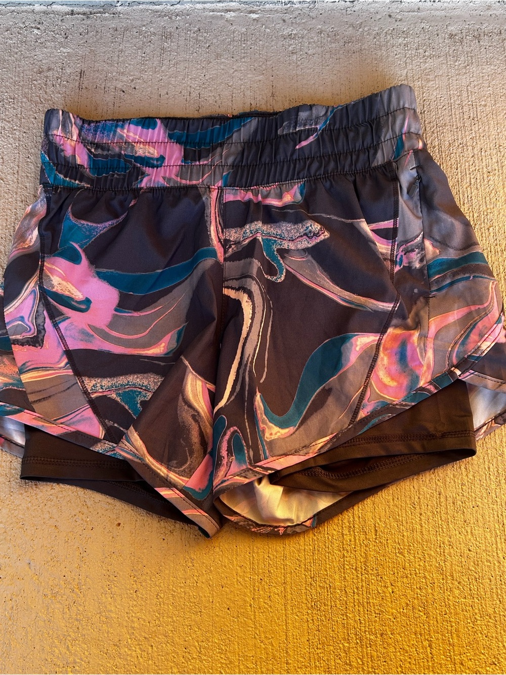 Avia Women's Abstract Print Athletic Shorts in Pink and Teal. SIZE XS